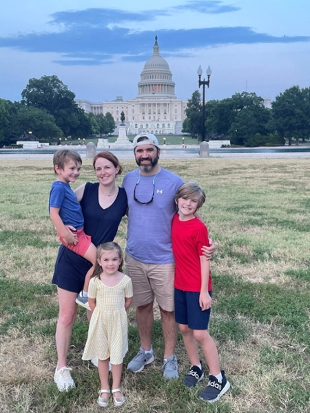 Dr. Caitlyn Reed with her husband, Dustin, and children,  Charlie, Jack, and Evie, in Washington, D.C.
